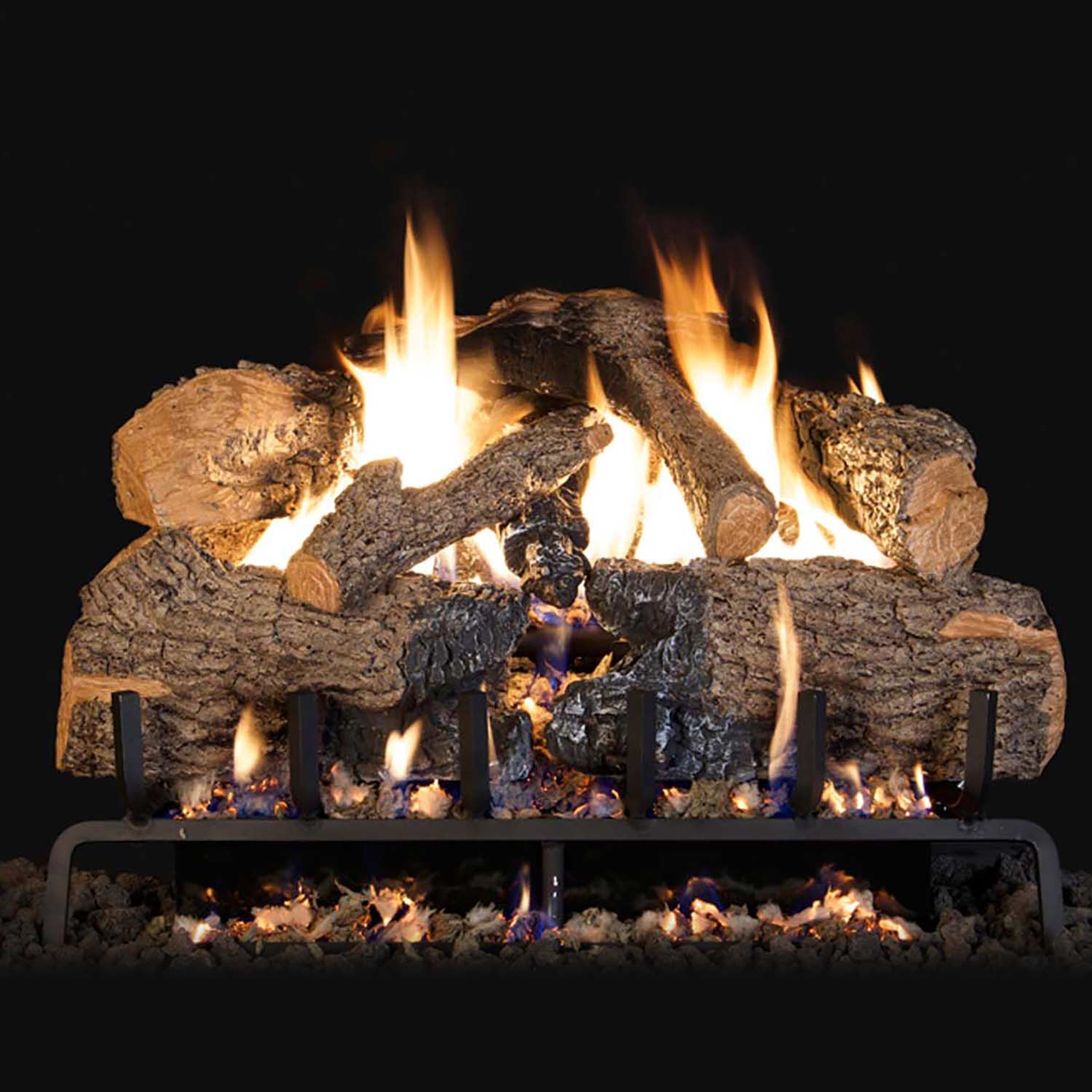 Vented gas log set with charred oak logs and flames over metal burner grate