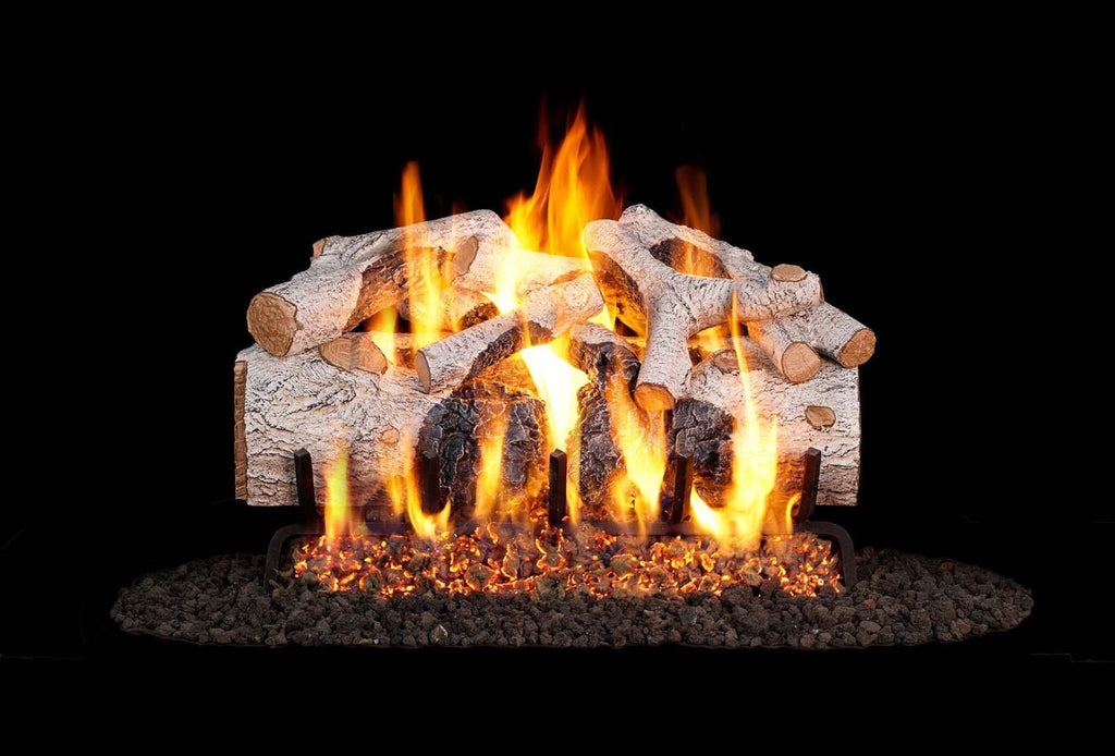 Charred mountain birch vented gas log set with burning flames and glowing embers