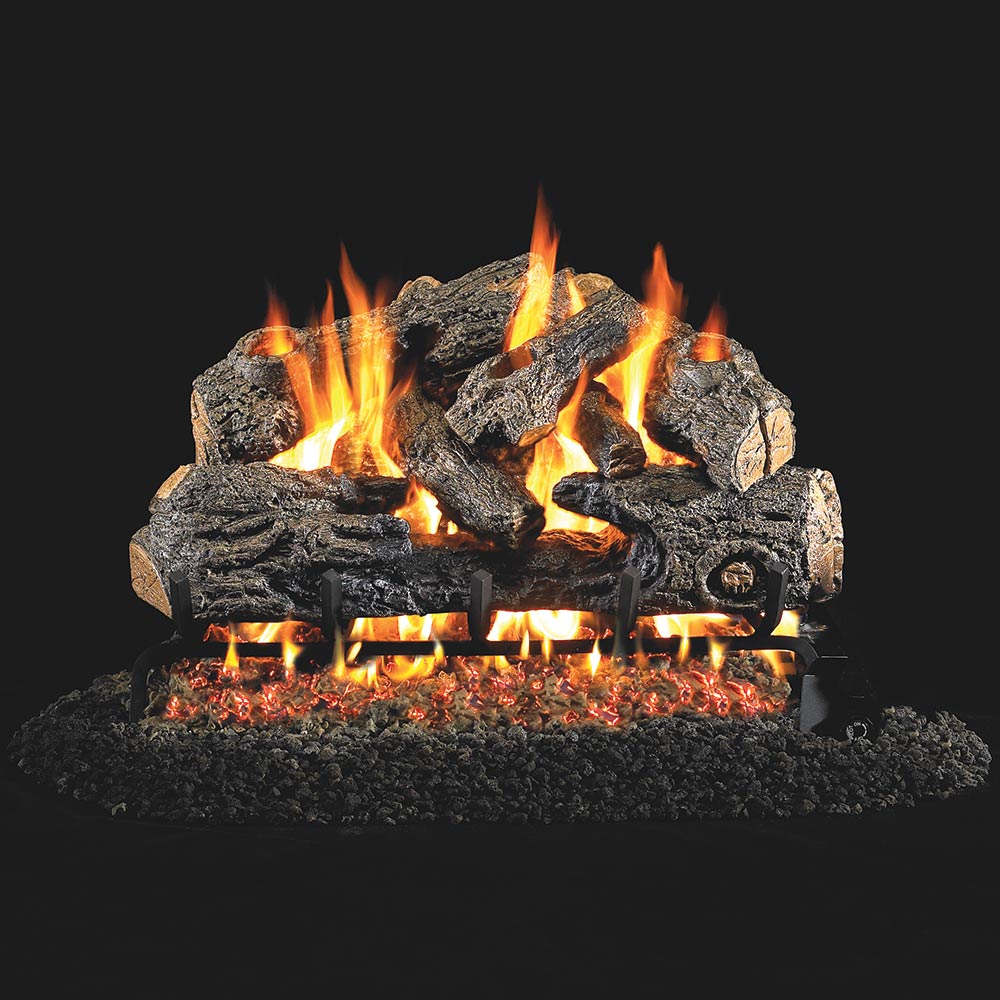 Charred northern vented gas log set with bright flames over dark, cracked logs