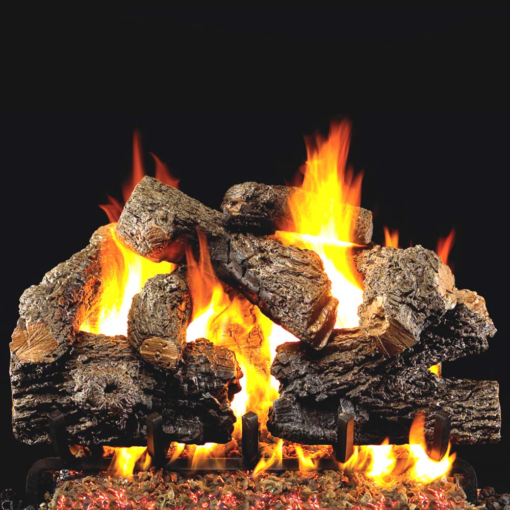 Charred vented gas log set with yellow-orange flames and dark charred logs