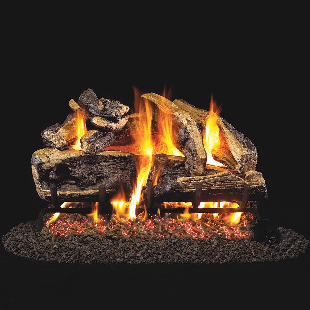Vented gas log set with charred split oak logs and visible flames, ember bed