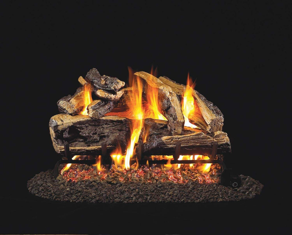 Vented gas log set with charred split oak logs, glowing embers, and active flames