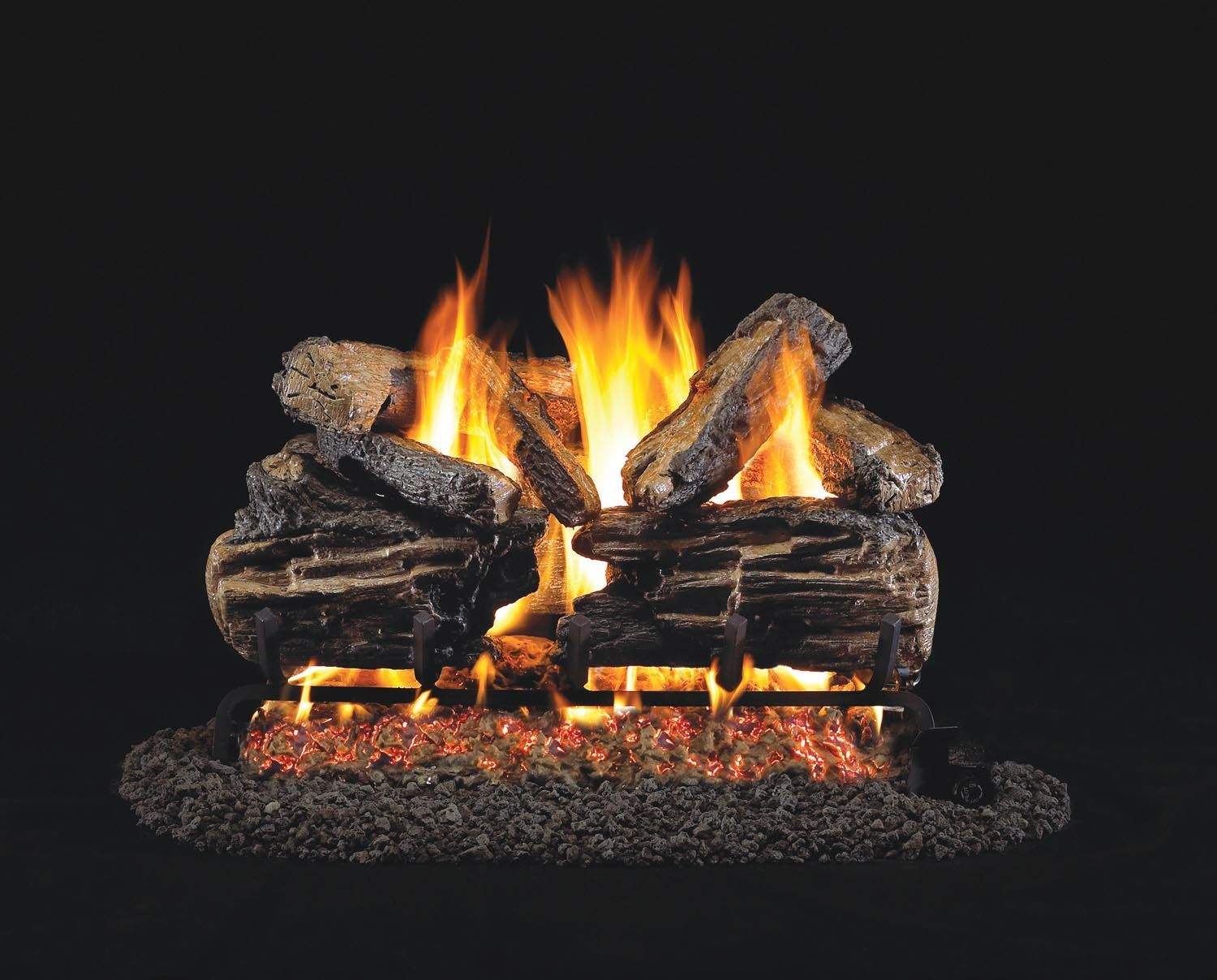 Charred split oak gas log set with glowing embers and open flames on vented burner