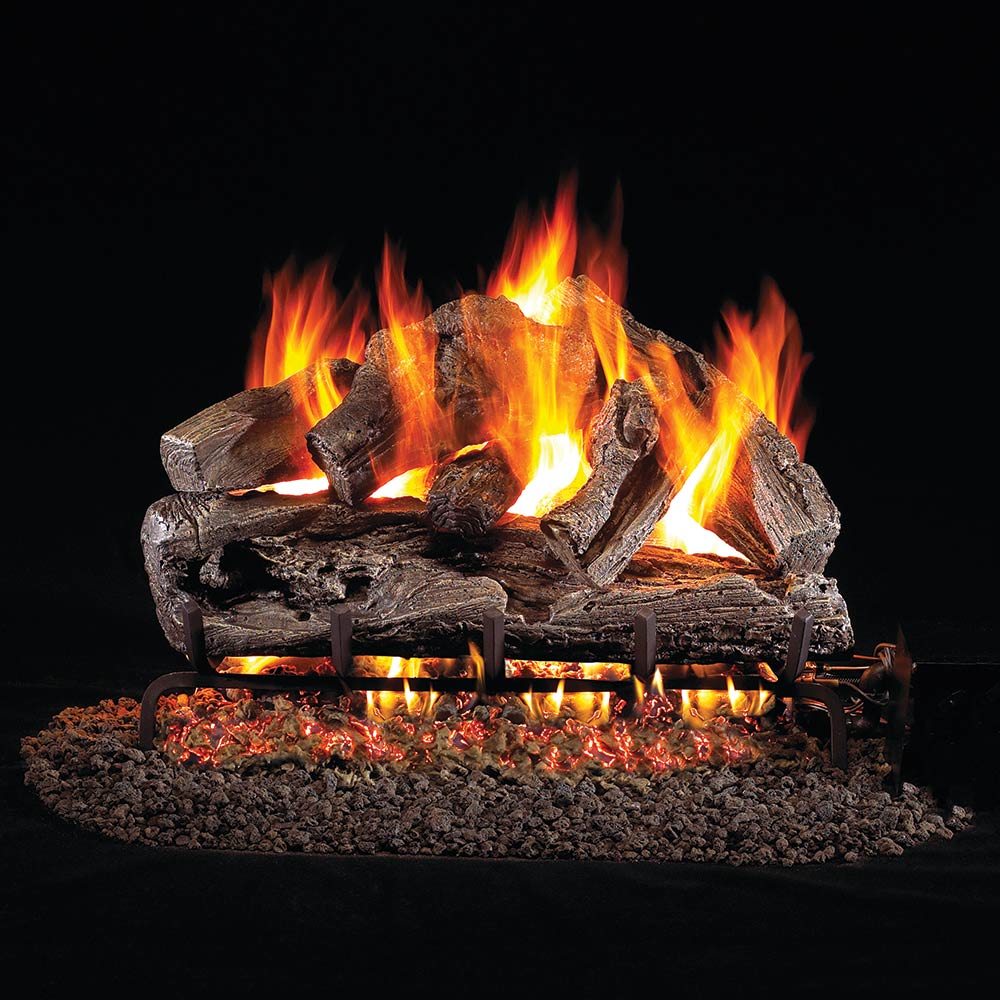 Real Fyre rugged oak vented gas logs with glowing flames and burning embers