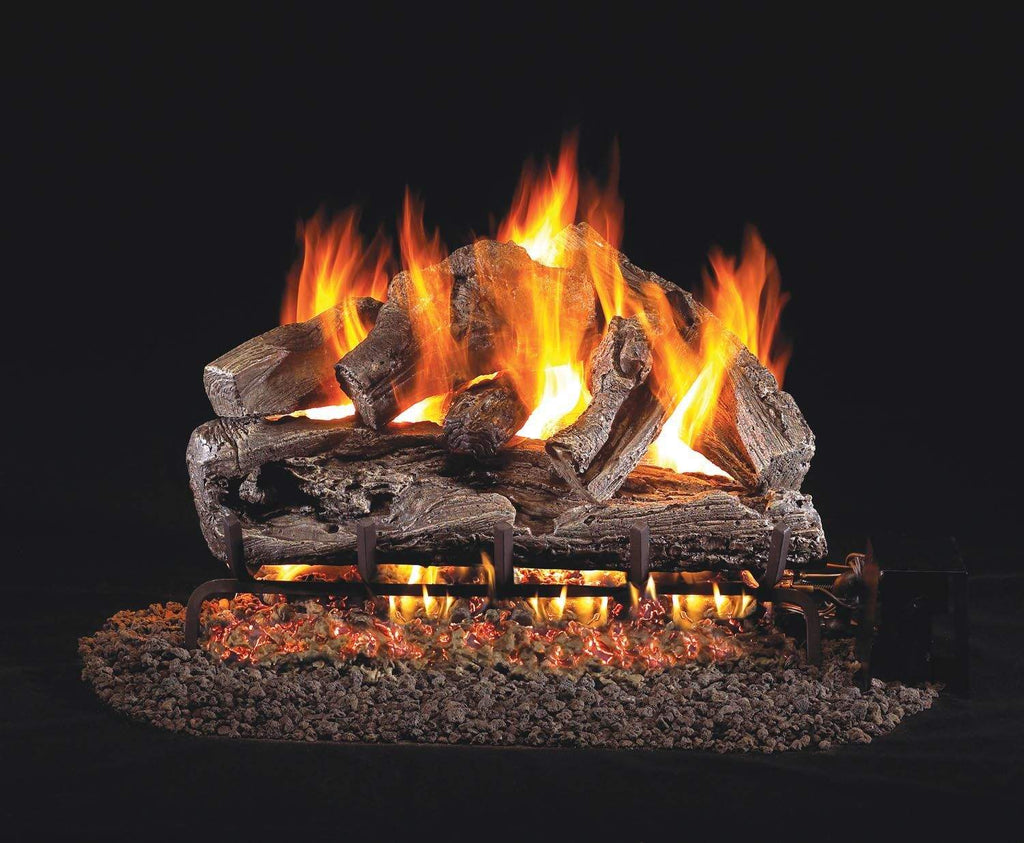 Vented gas log set with burning flames and oak-style split logs on a burner base