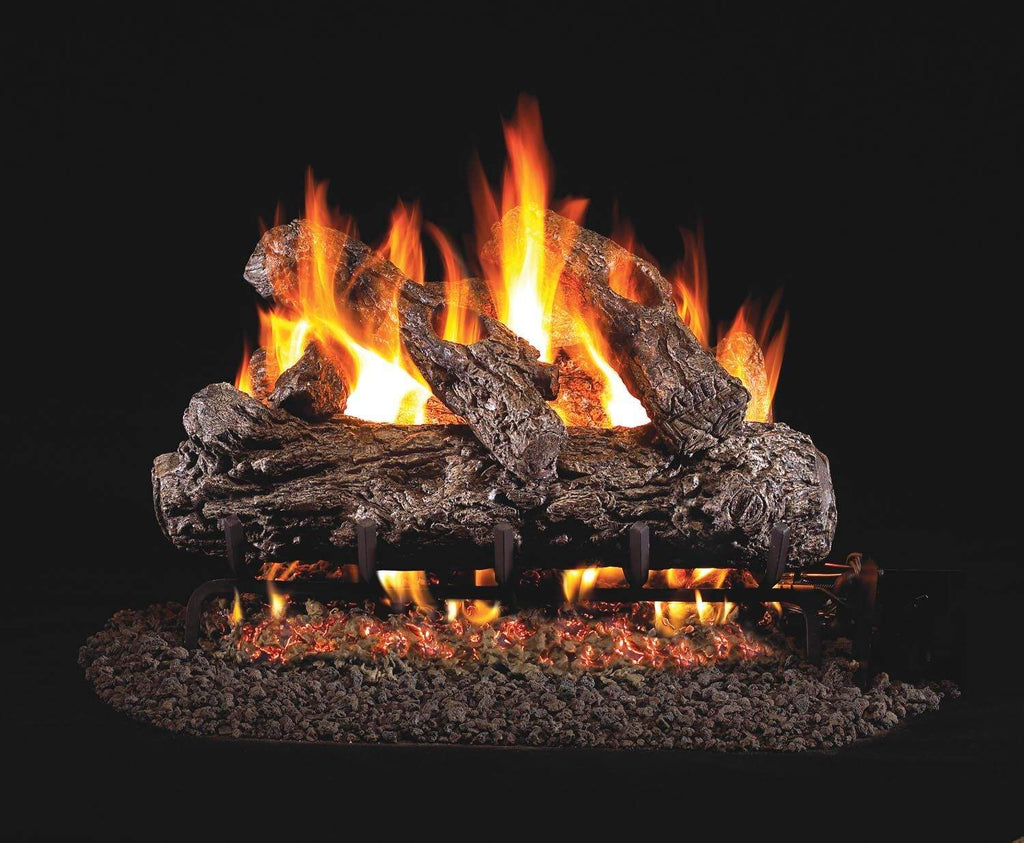 Rustic oak gas log set with bright flames and glowing embers in a burner tray