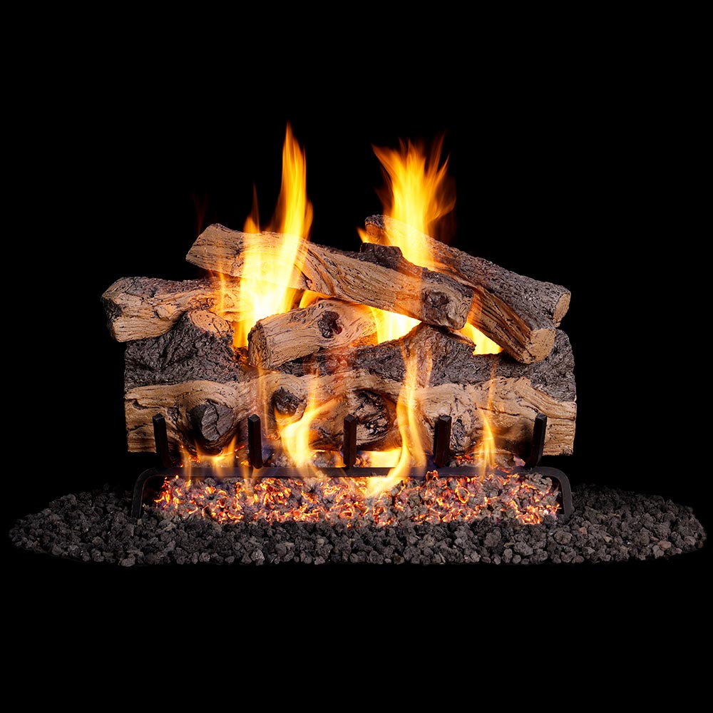 Vented gas log set with stacked oak logs and bright flames over a dark firebed