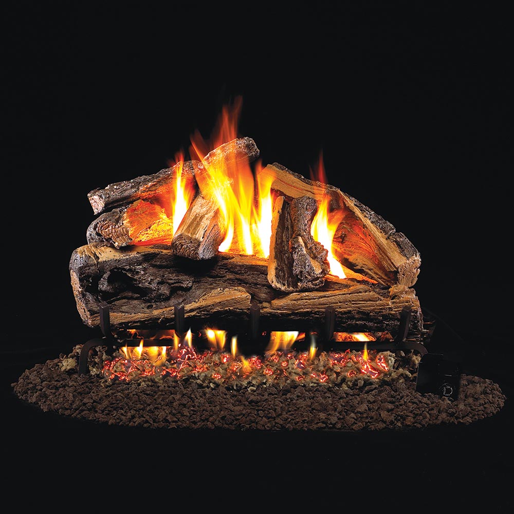 Vented gas log set with glowing split oak logs and open flames on a burner base