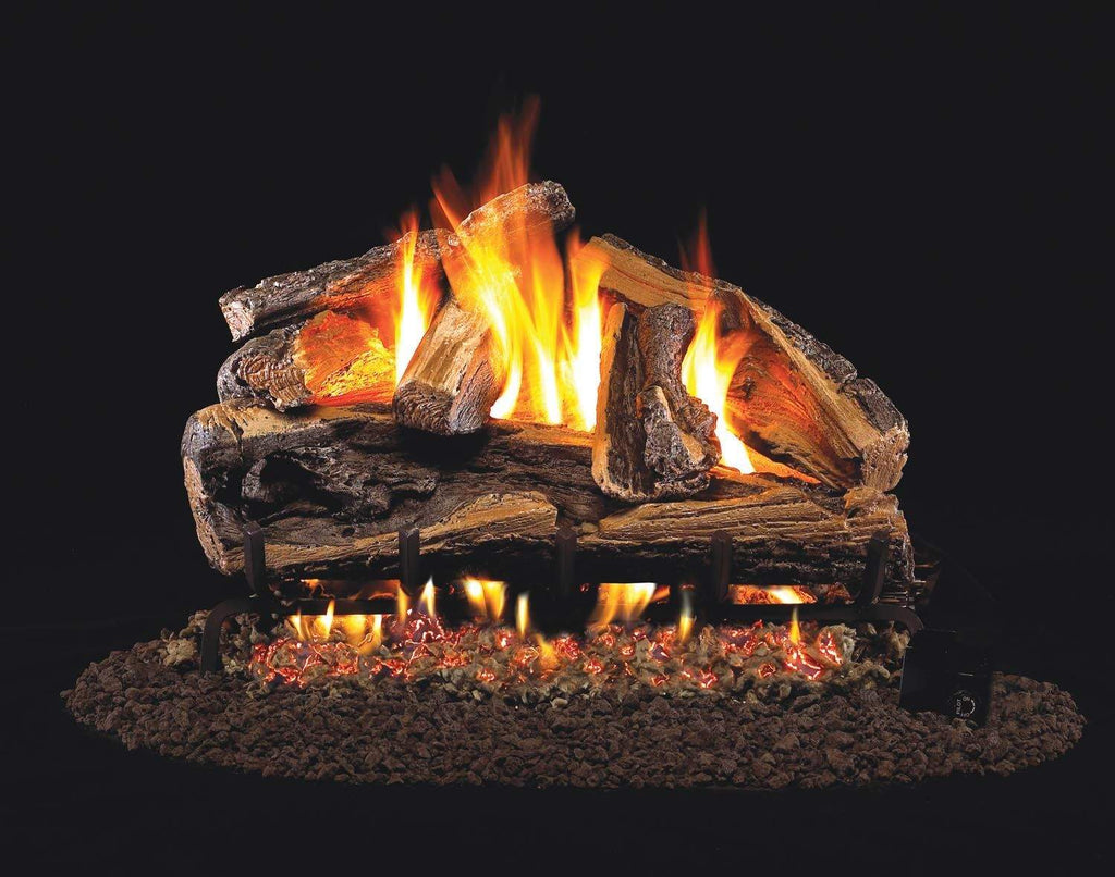 Vented gas log set with burning split oak log pieces and glowing ember bed
