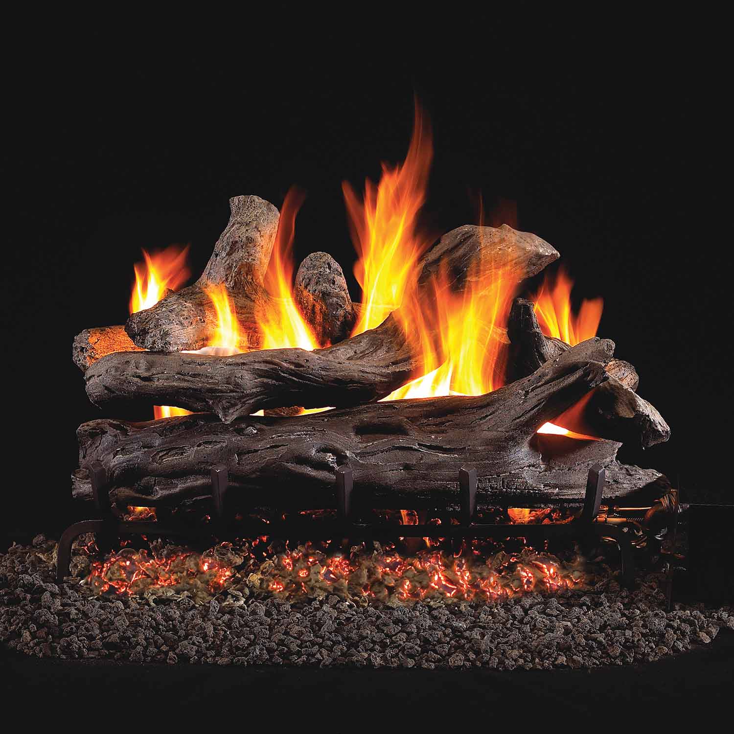 Real Fyre vented gas log set with burning driftwood-style logs and glowing embers