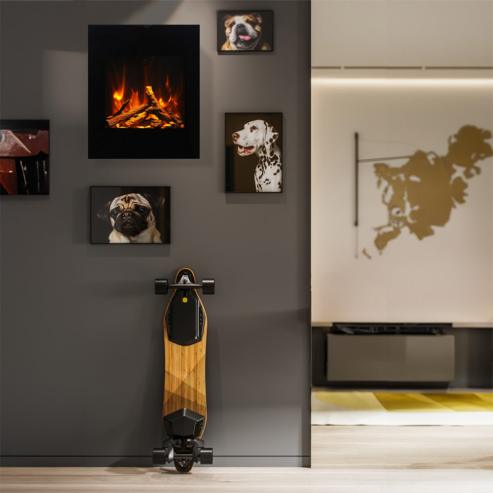 Black wall-mounted electric fireplace insert with glowing flame and log set