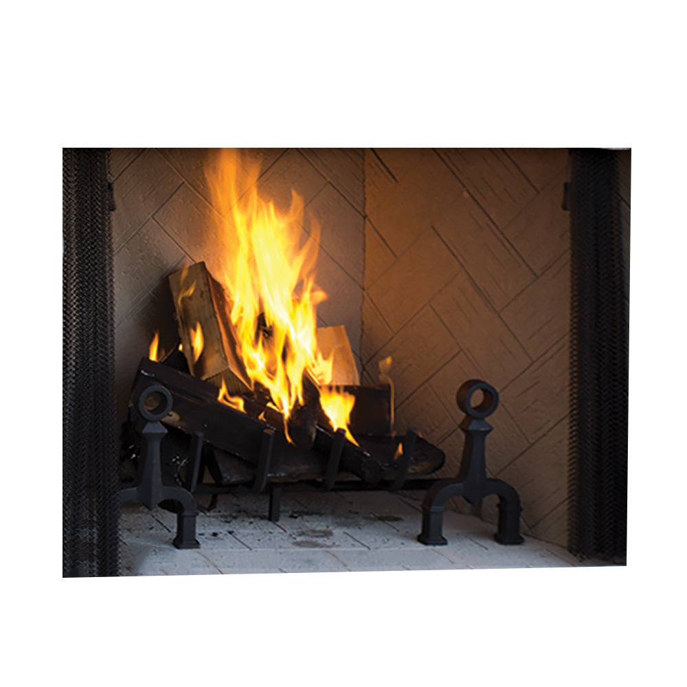 Wood-burning fireplace with flames in a dark firebox and black fireplace tools