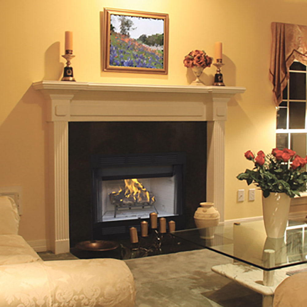 Wood-burning fireplace with white mantel and dark firebox, burning logs visible