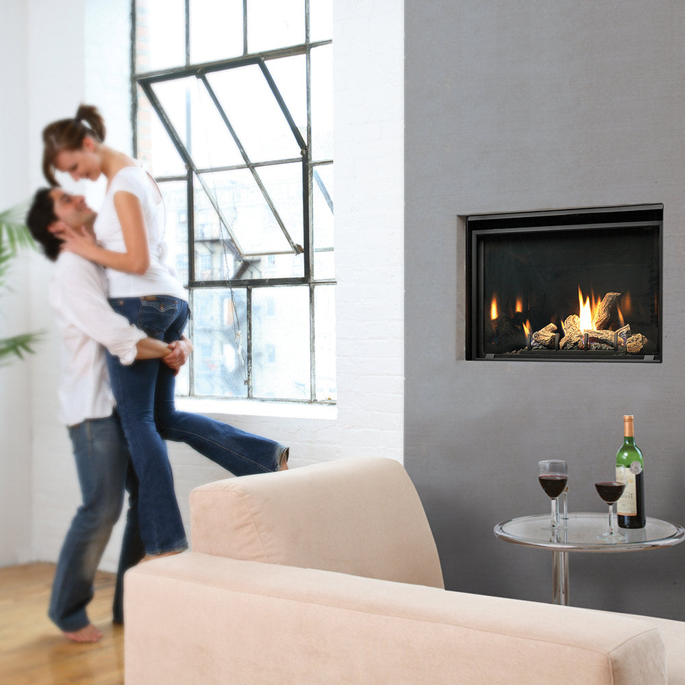 Direct vent gas fireplace with log set, black opening showing flames over dark firewood logs