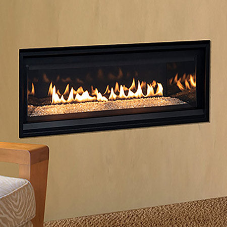 Direct vent gas fireplace with black frame, burning flames and crushed glass bed