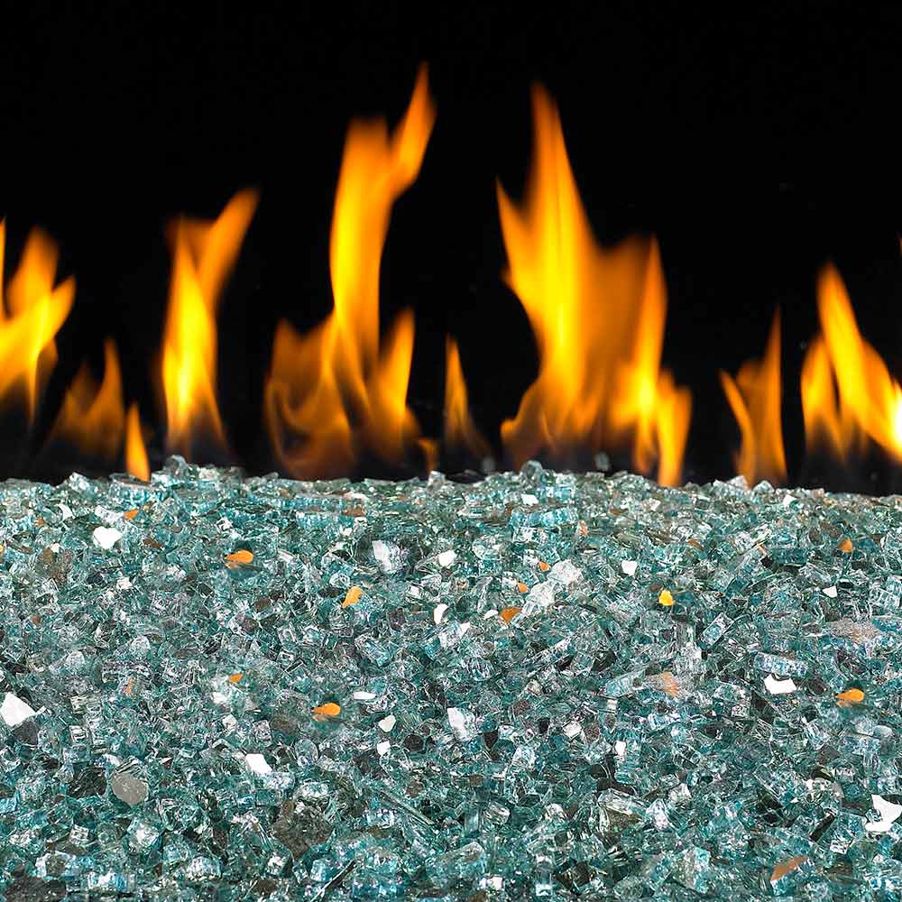 Aqua reflective fire glass layer with small sparkling shard pieces for fire pits