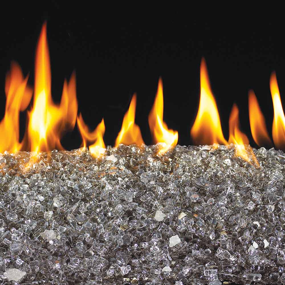 Bronze fire glass bed with flames burning through the stones