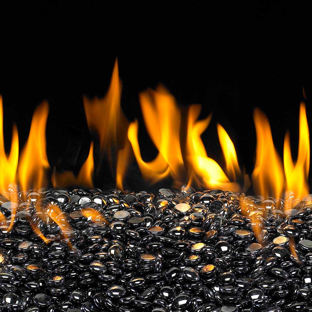 Pile of glossy black round fire pit glass gems
