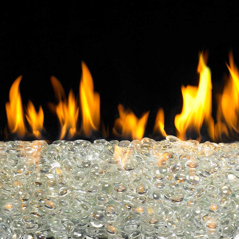 Glacier-style glass fire gems scattered in a bed before burning flames