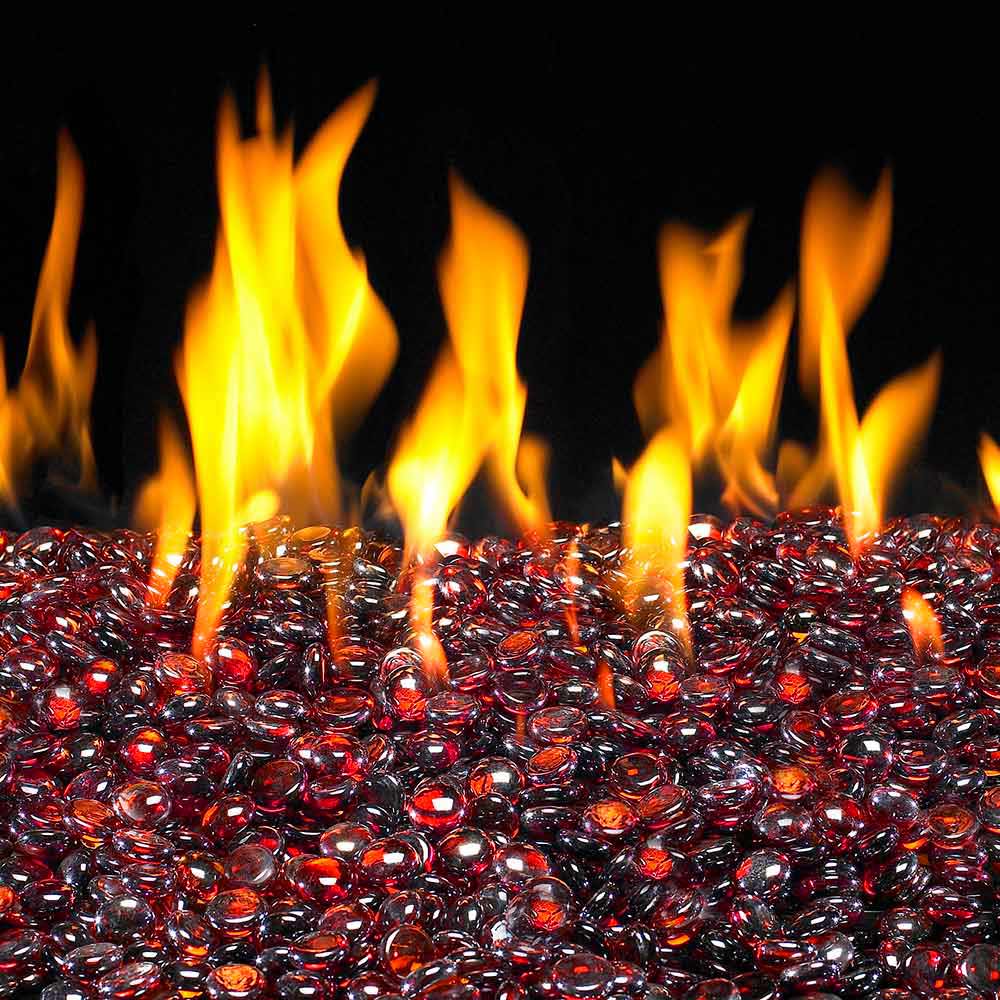 Ruby red and clear glass fire pit gems with flames rising