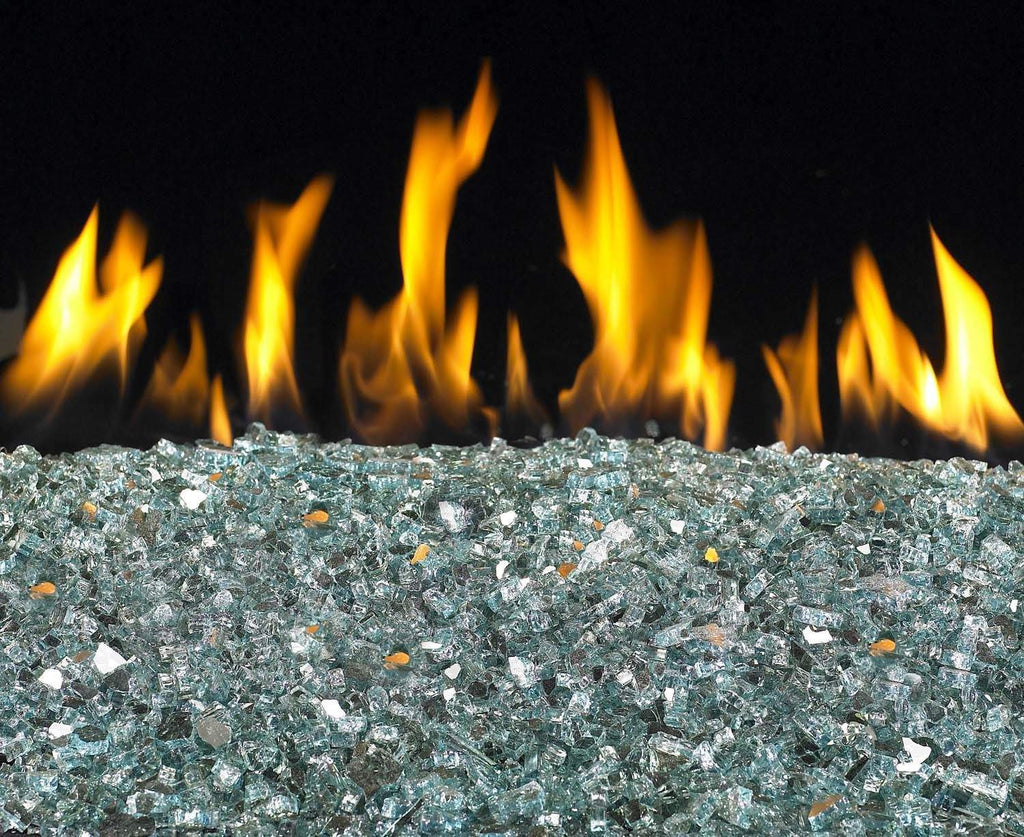 Vent-free glass burner with yellow flames over blue-gray crushed glass media