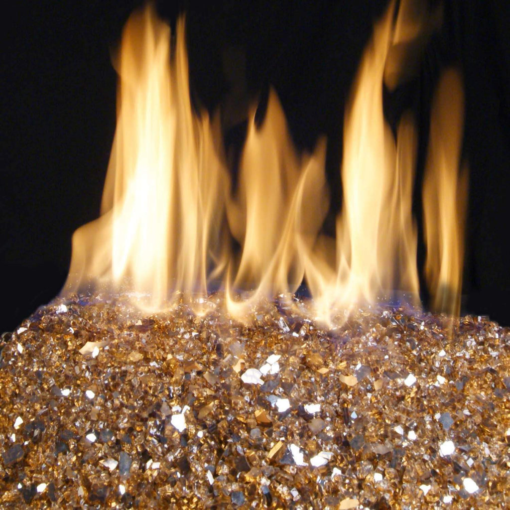 Burner flames with warm yellow tips above copper-toned glass media