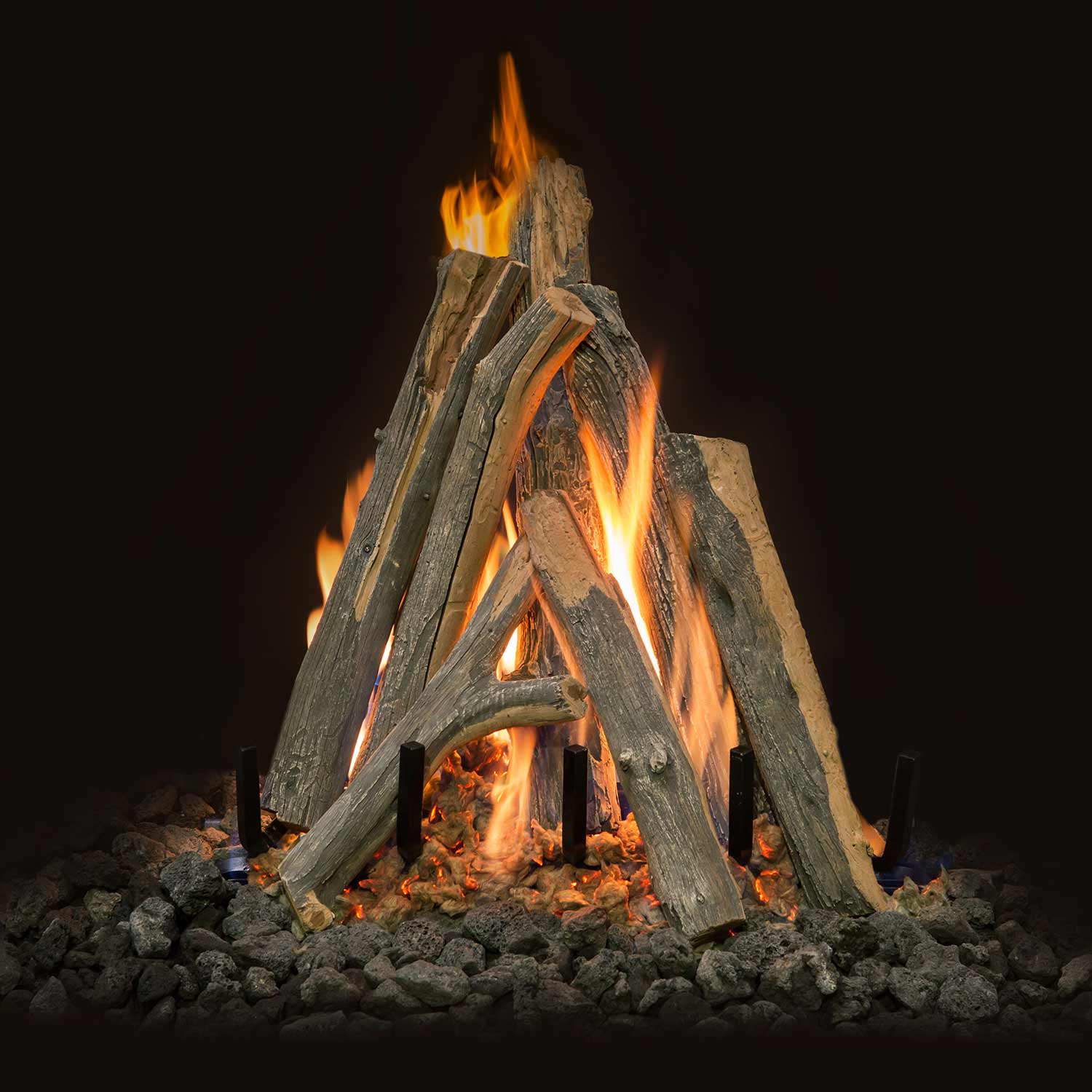 Juniper Kiva gas logs set with glowing flames and stacked log pieces