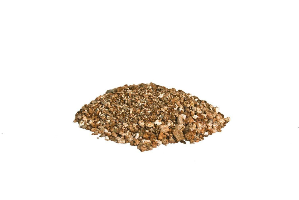 Real Fyre vermiculite granules, small brown granular rocks pile