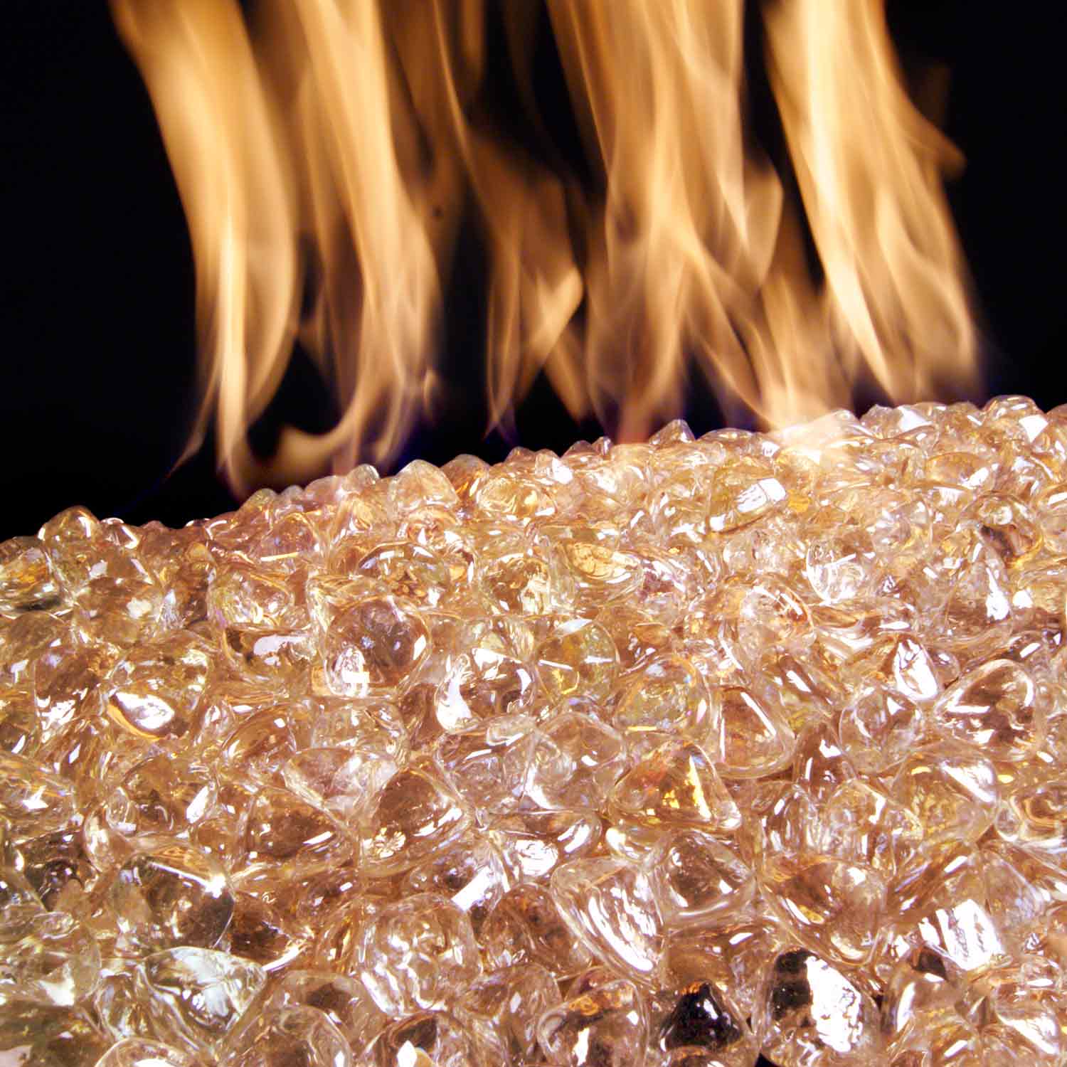 Rose diamond fire pit nuggets with flame glow, translucent orange-pink glass
