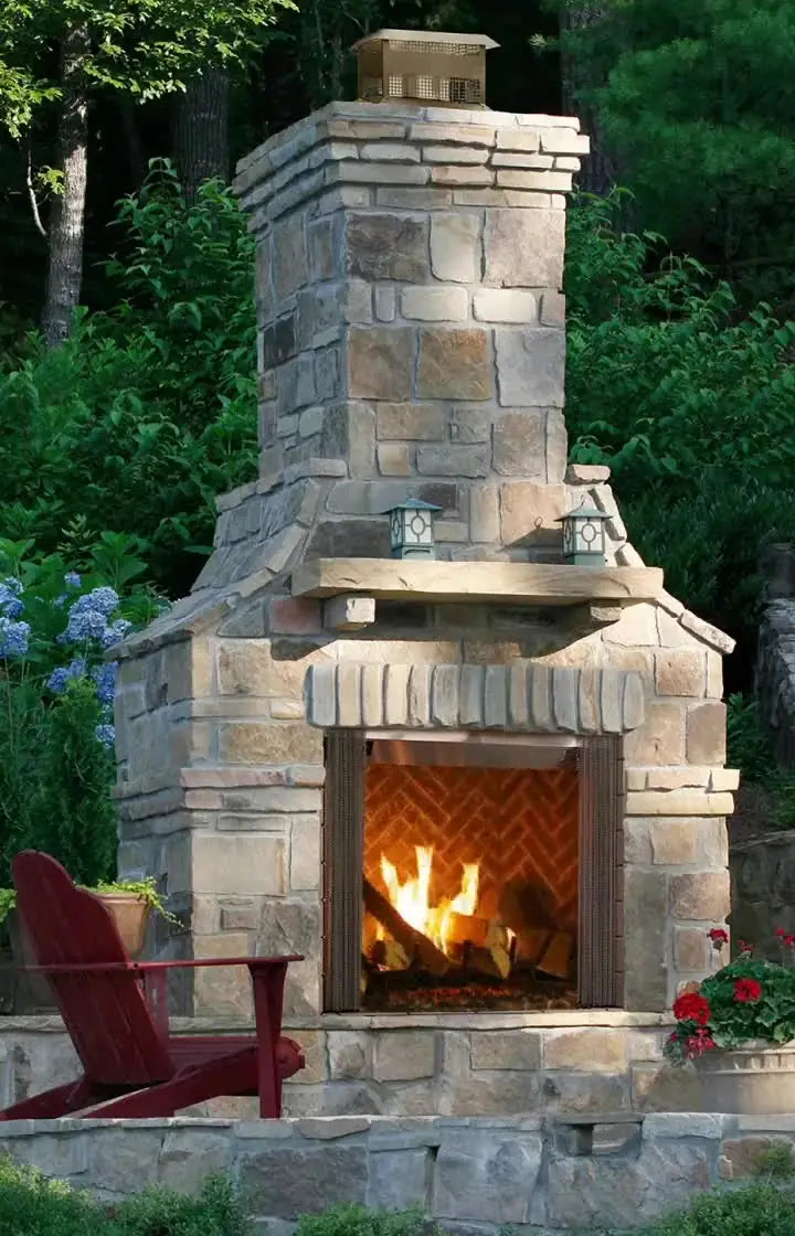 Outdoor gas fireplace in a stone patio setting