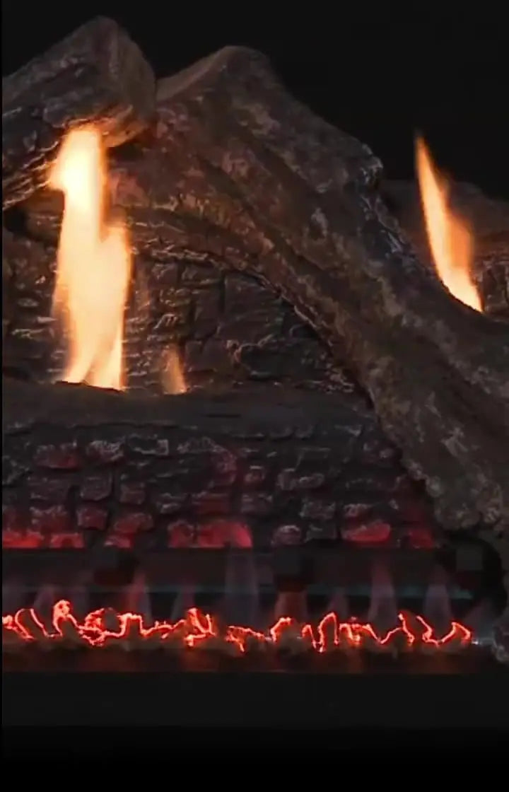 Vented gas log set displayed in a fireplace