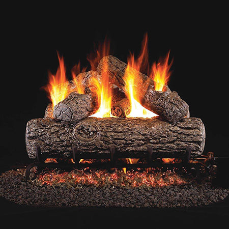 Real Fyre R vented gas log set with glowing flames and stacked dark logs